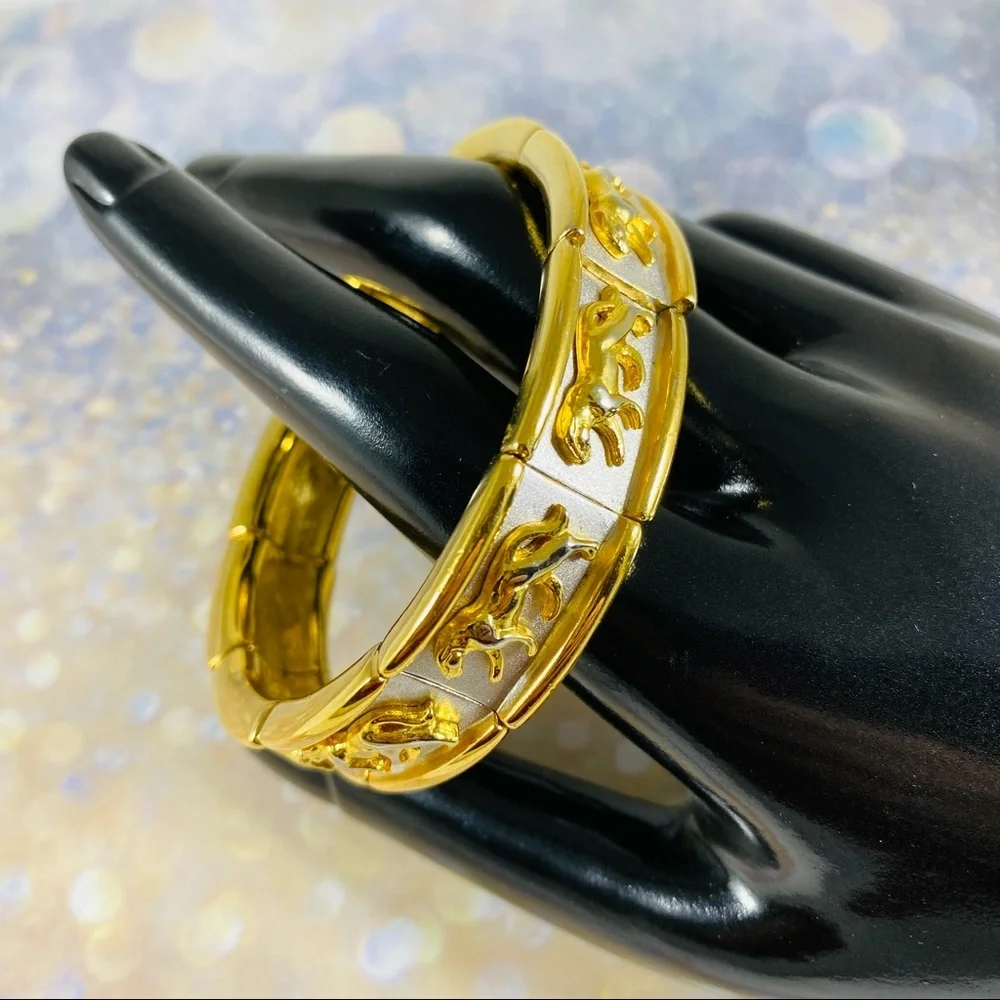 Killer cool 1980s two tone stretch link gold silver panther bracelet